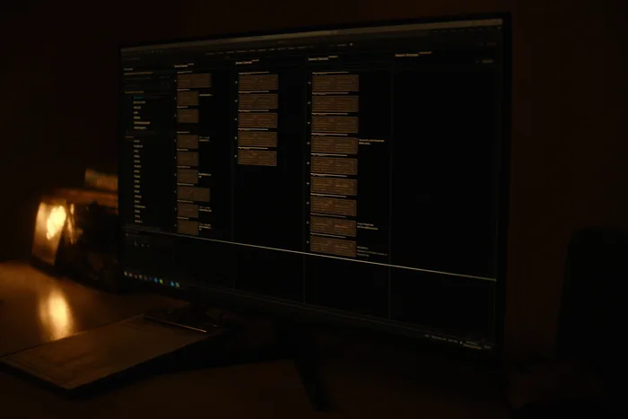 A job dispatch board on a monitor, work cards arranged in columns.