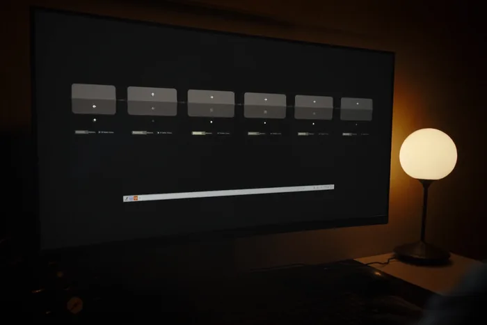 A deployment pipeline on a monitor, its stages shown as a row of blocks.